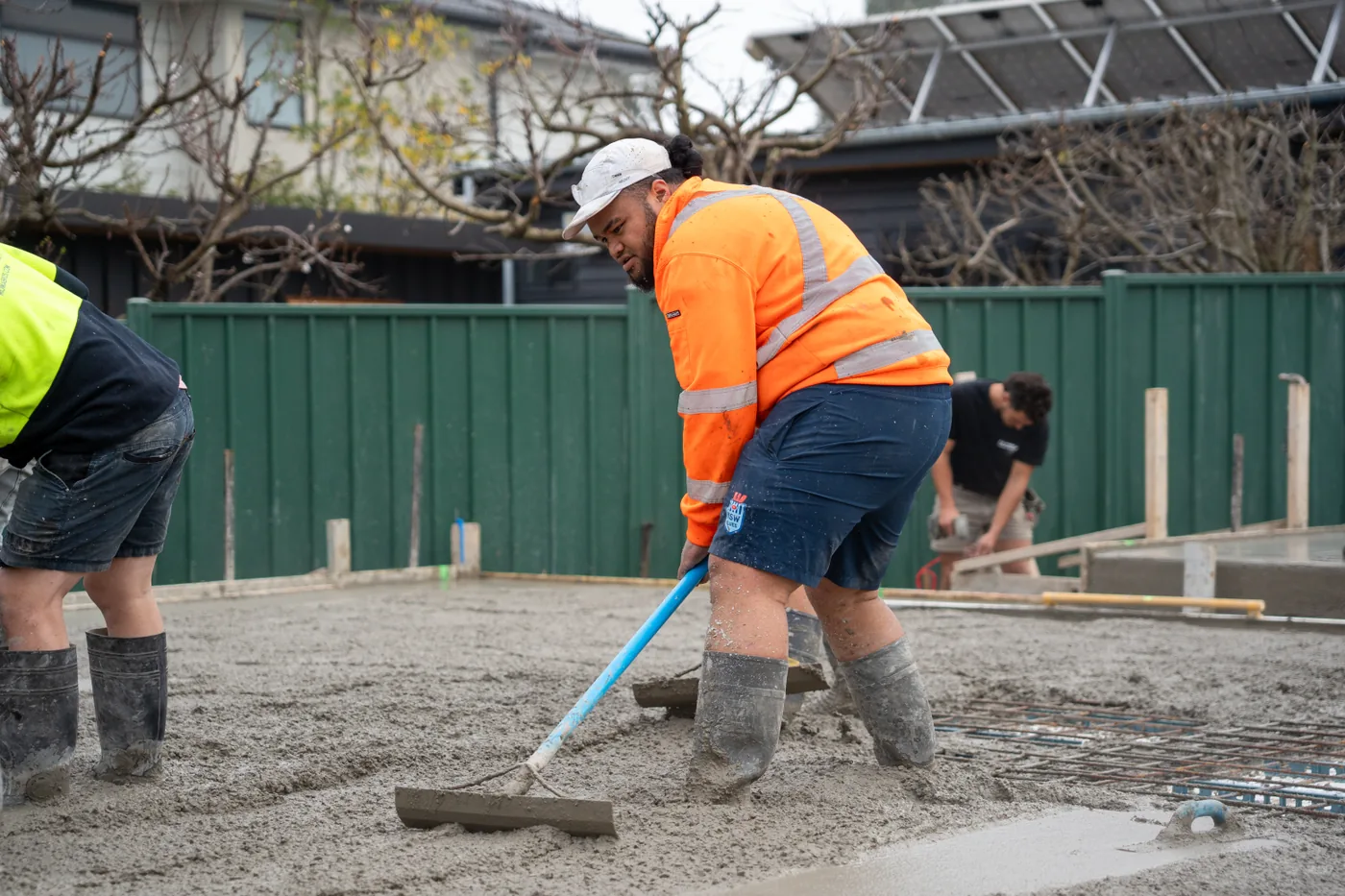 Concrete slab being screeded on a Melbourne residential construction site